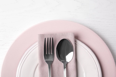 Photo of Beautiful table setting on white wooden background, flat lay