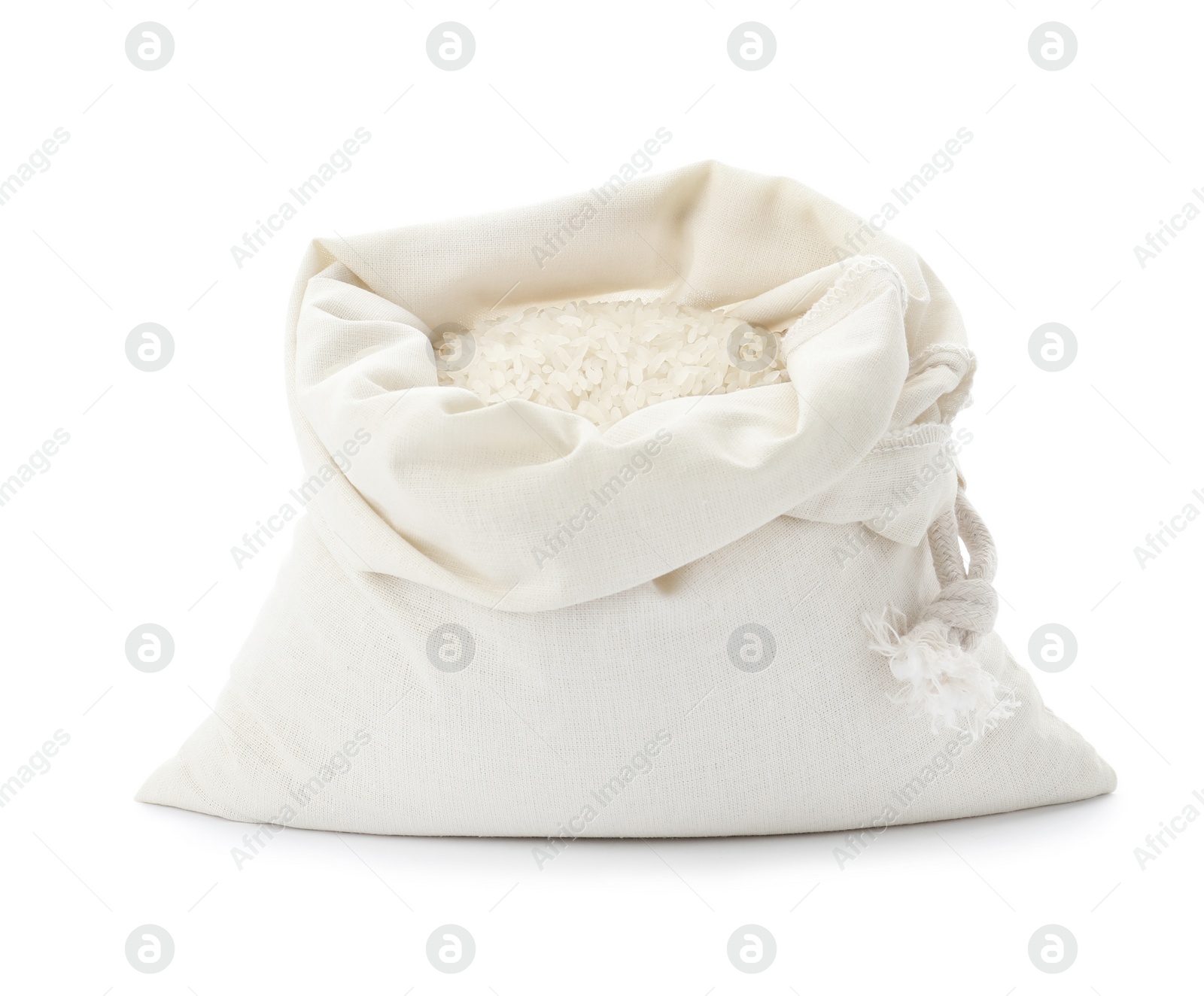 Photo of Cotton eco bag with rice isolated on white