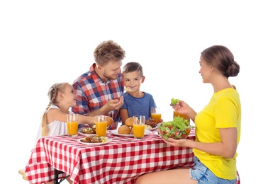 Photo of Happy family having picnic at table on white background