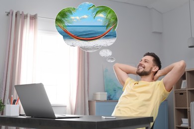 Image of Man dreaming about vacation at table in office