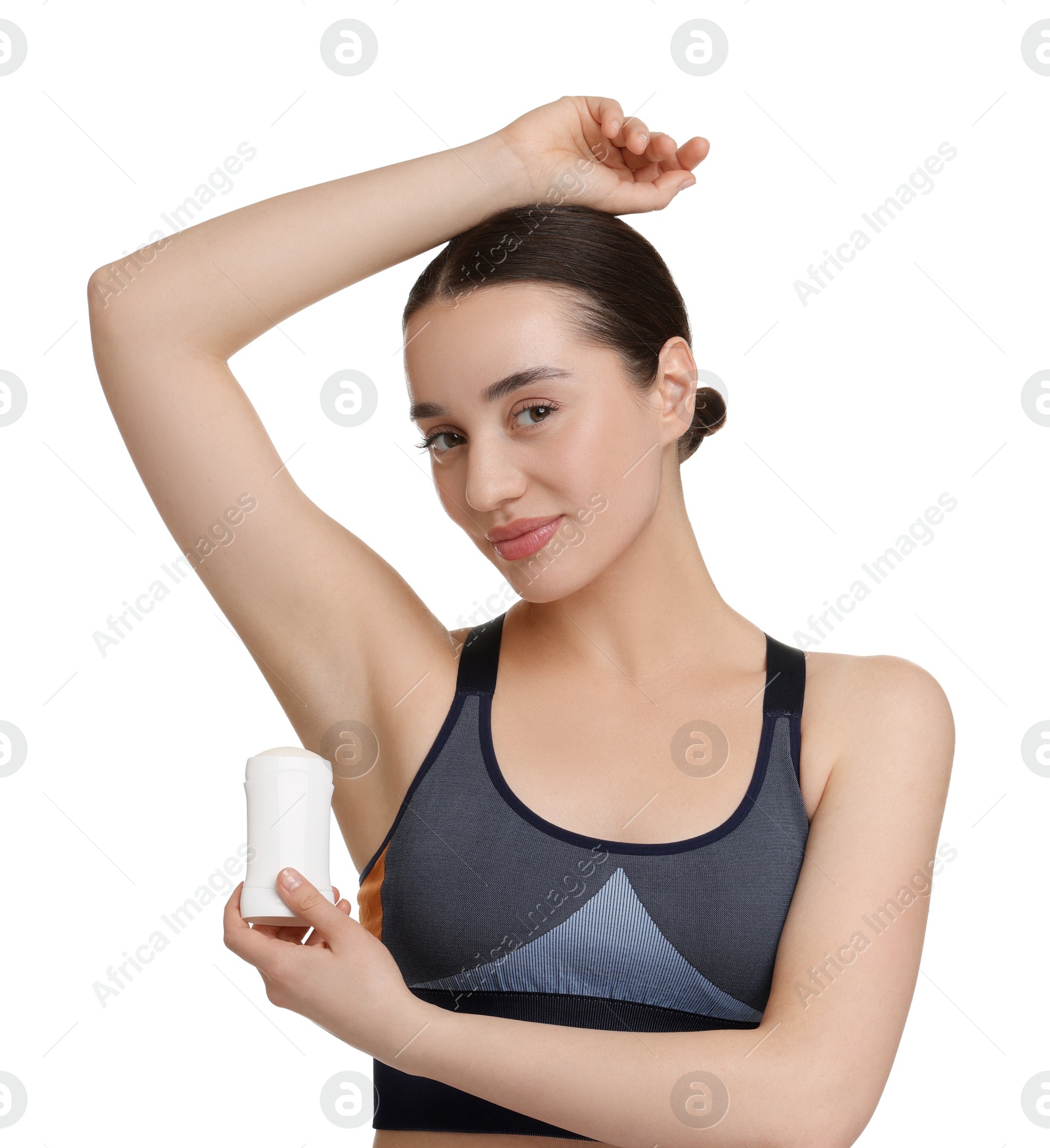 Photo of Beautiful woman applying deodorant on white background