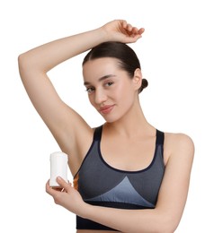 Photo of Beautiful woman applying deodorant on white background