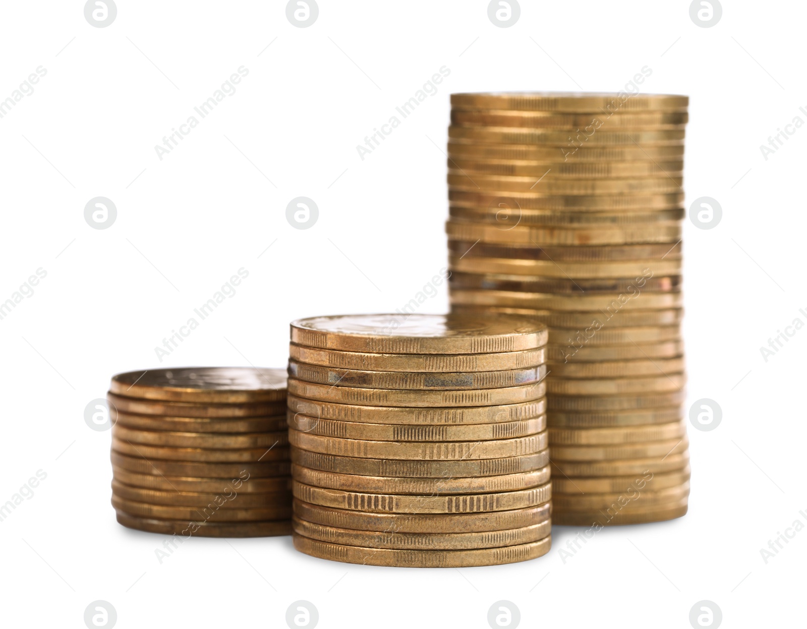 Photo of Many golden coins stacked on white background