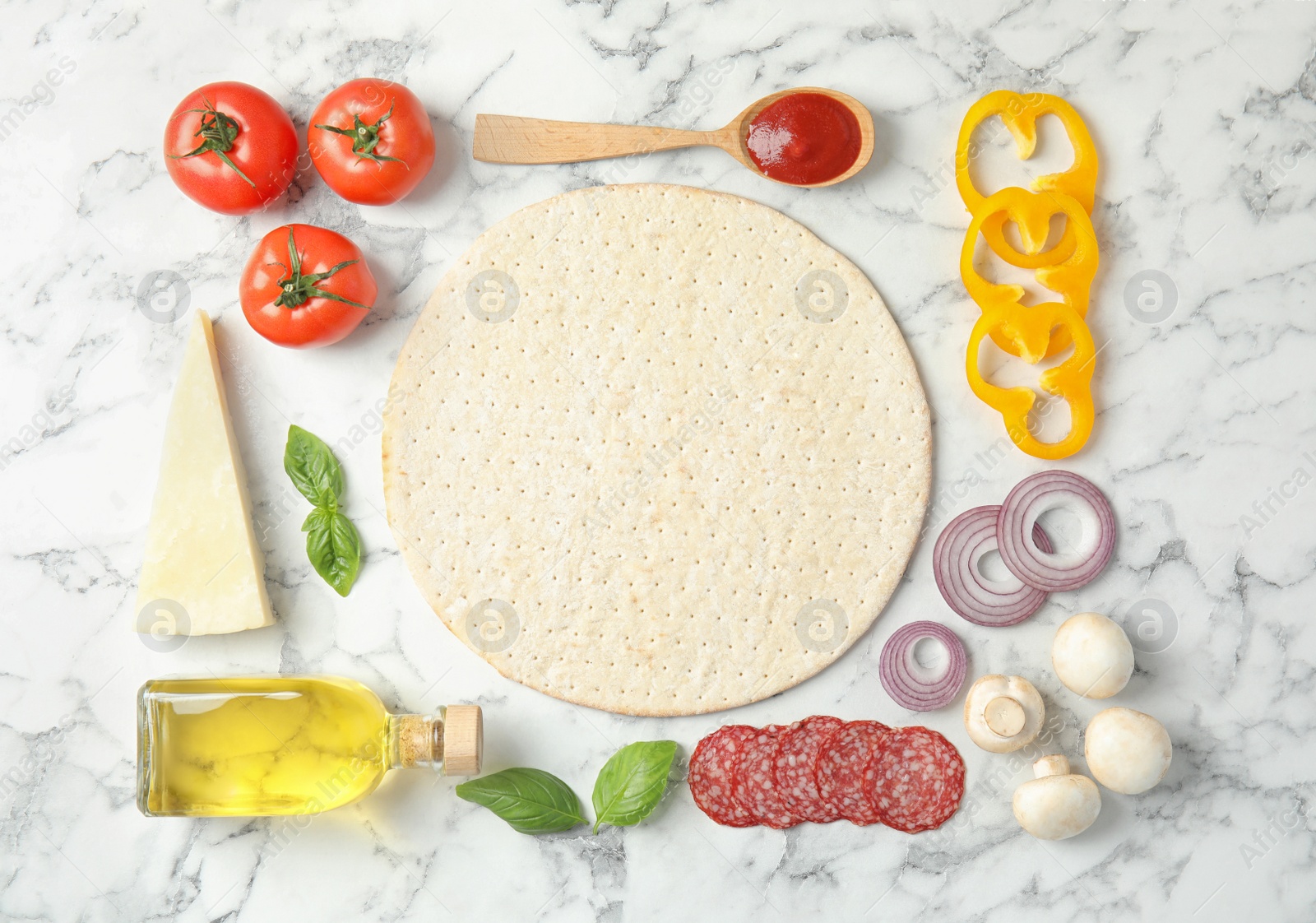 Photo of Flat lay composition with base and ingredients for pizza on marble table