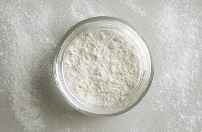 Photo of Rice loose face powder on light grey background, top view. Makeup product