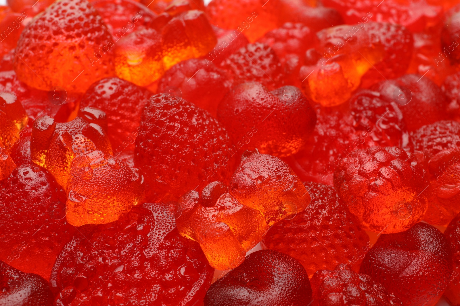 Photo of Mix of different delicious gummy candies as background, closeup