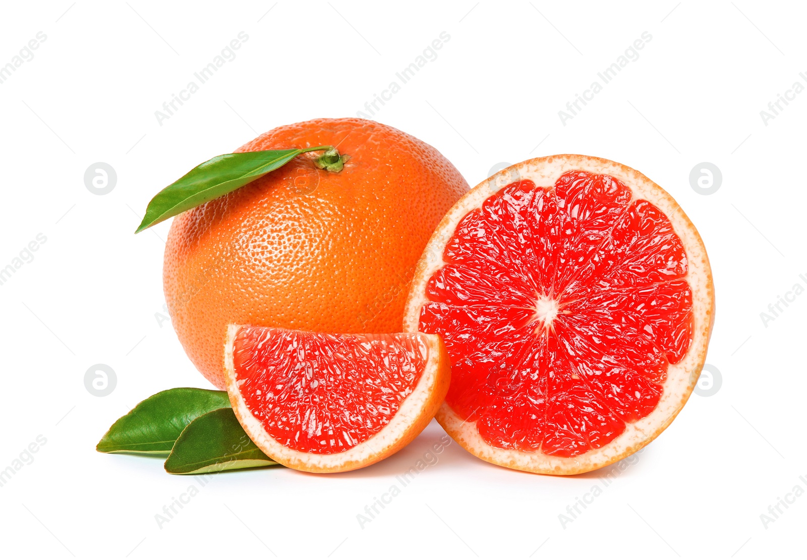 Photo of Whole and cut ripe grapefruits isolated on white