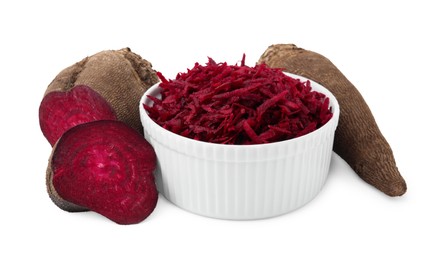Photo of Whole, cut and grated red beets in bowl isolated on white