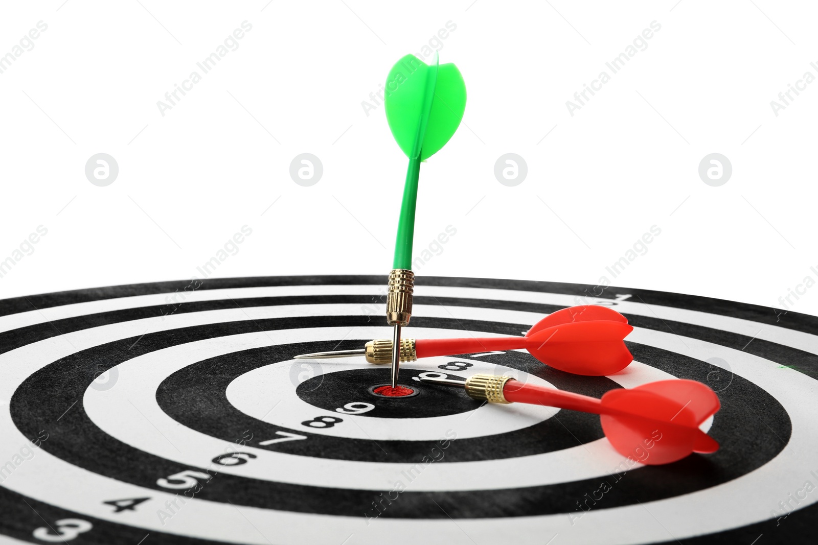 Photo of Arrow hitting target on dart board against white background