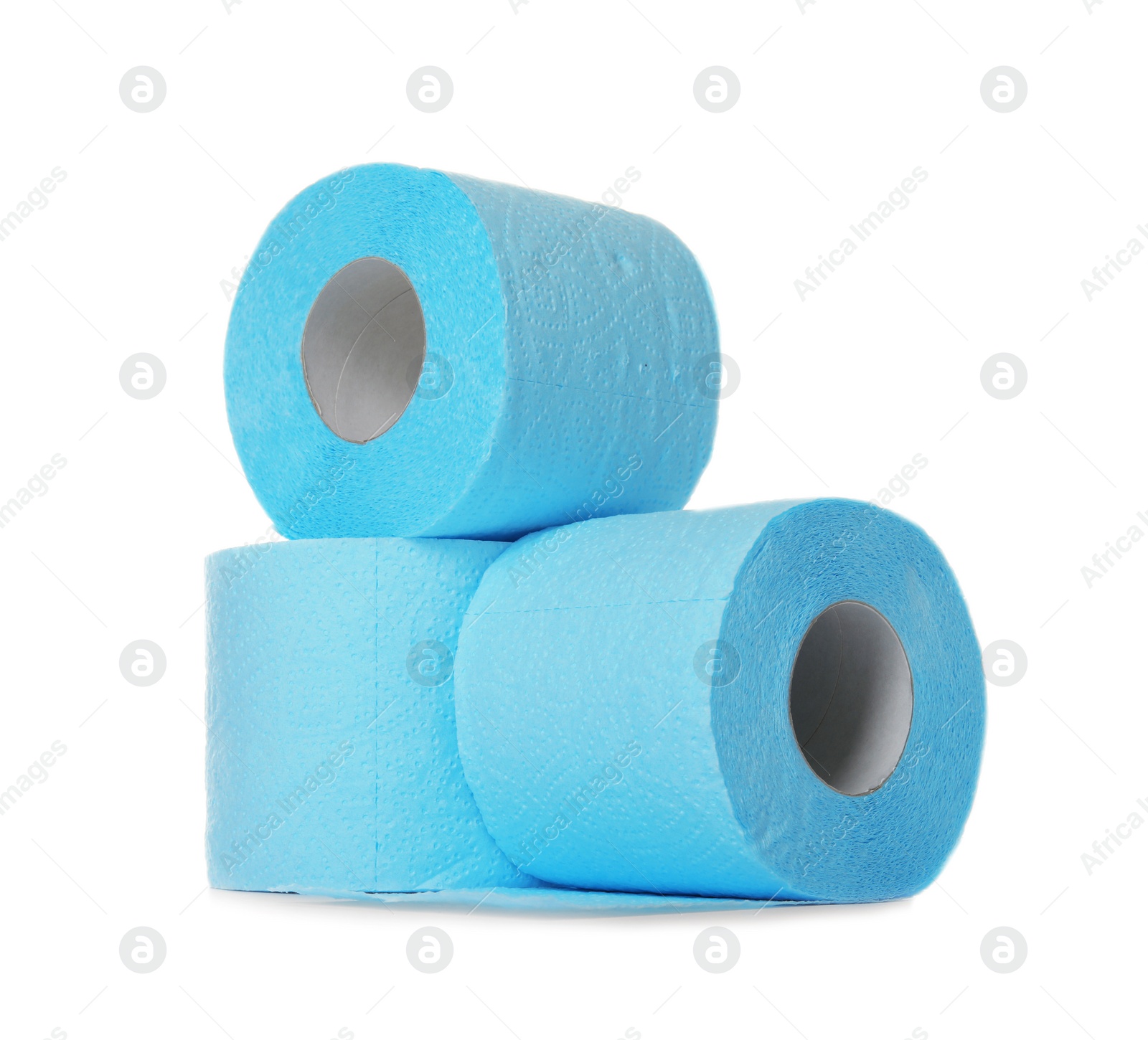 Photo of Color toilet paper rolls on white background