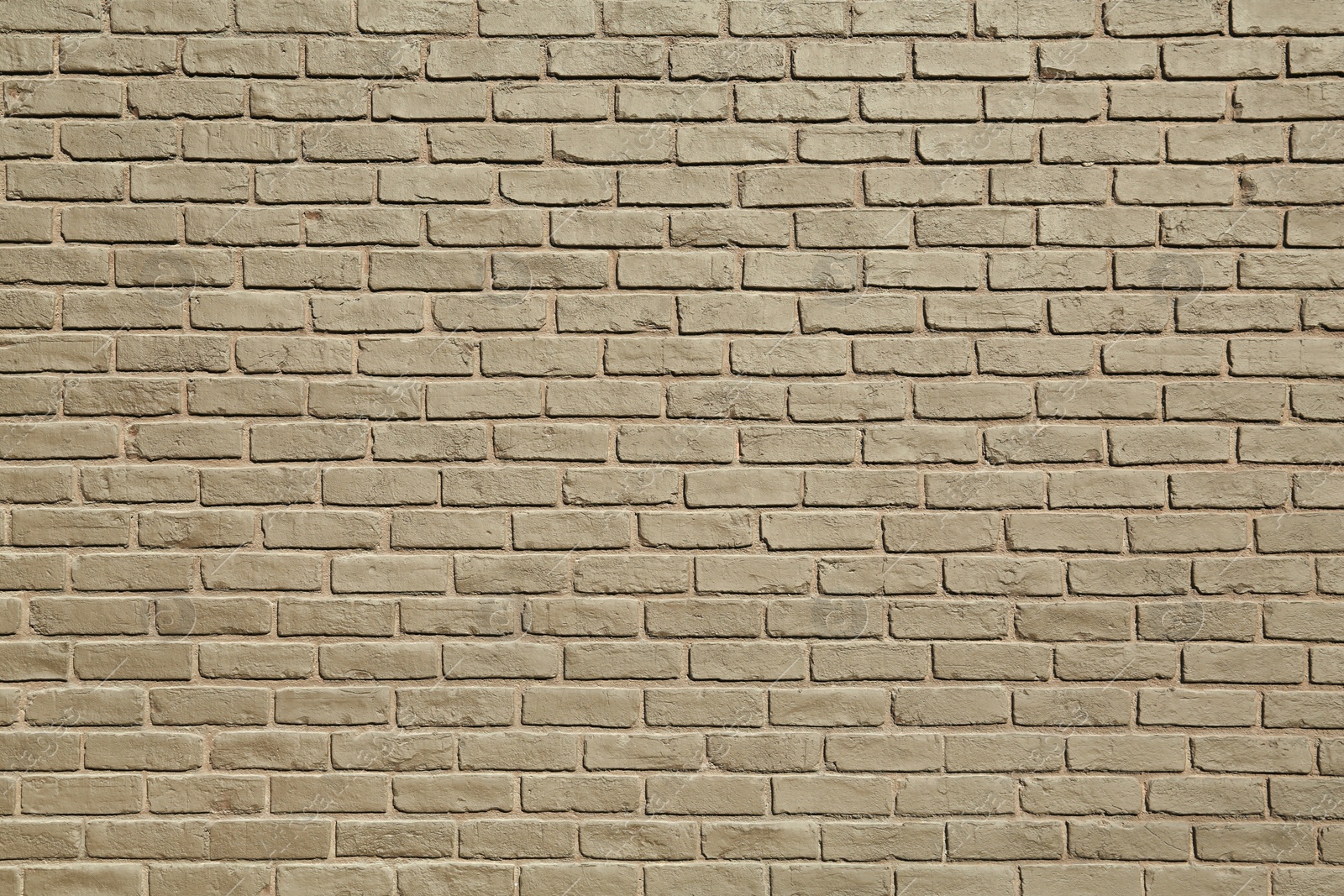 Photo of Texture of brown brick wall as background