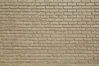 Photo of Texture of brown brick wall as background