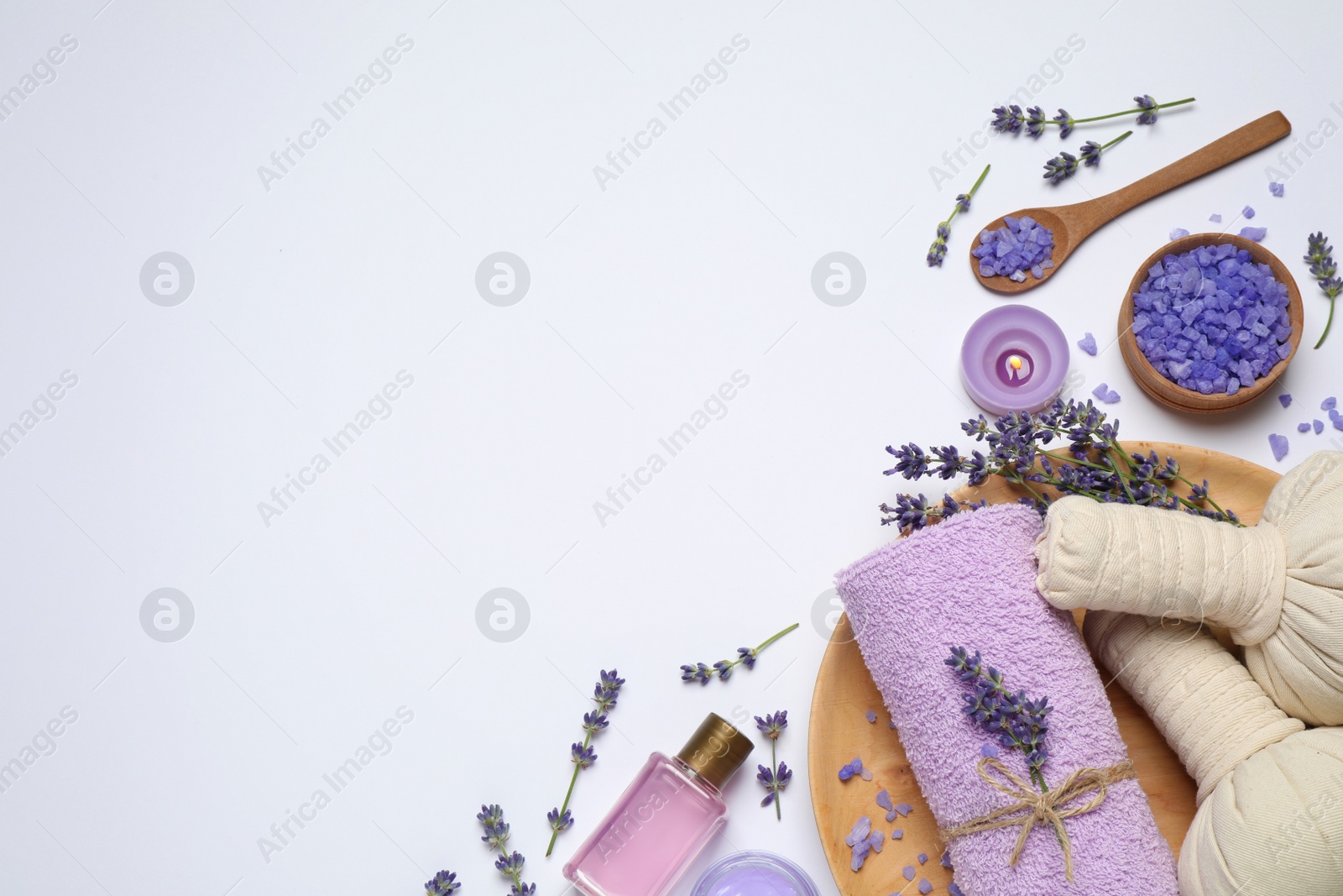 Photo of Composition with lavender flowers and natural cosmetic products on white background, top view
