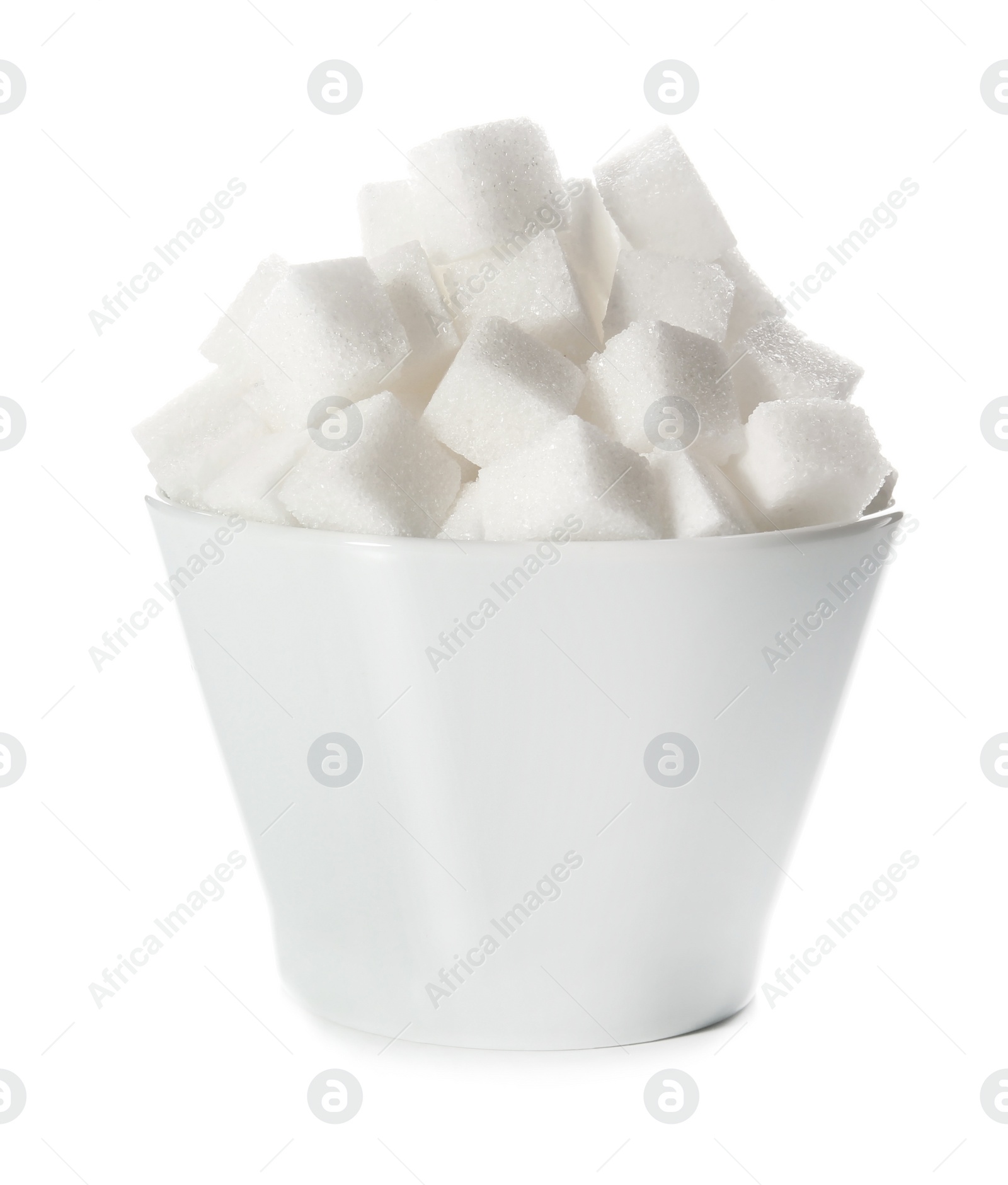 Photo of Refined sugar cubes in bowl on white background