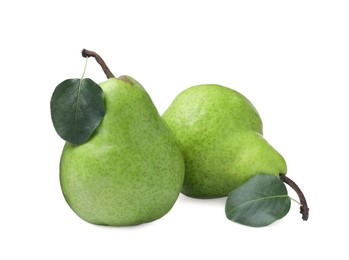 Photo of Fresh ripe pears with green leaves on white background