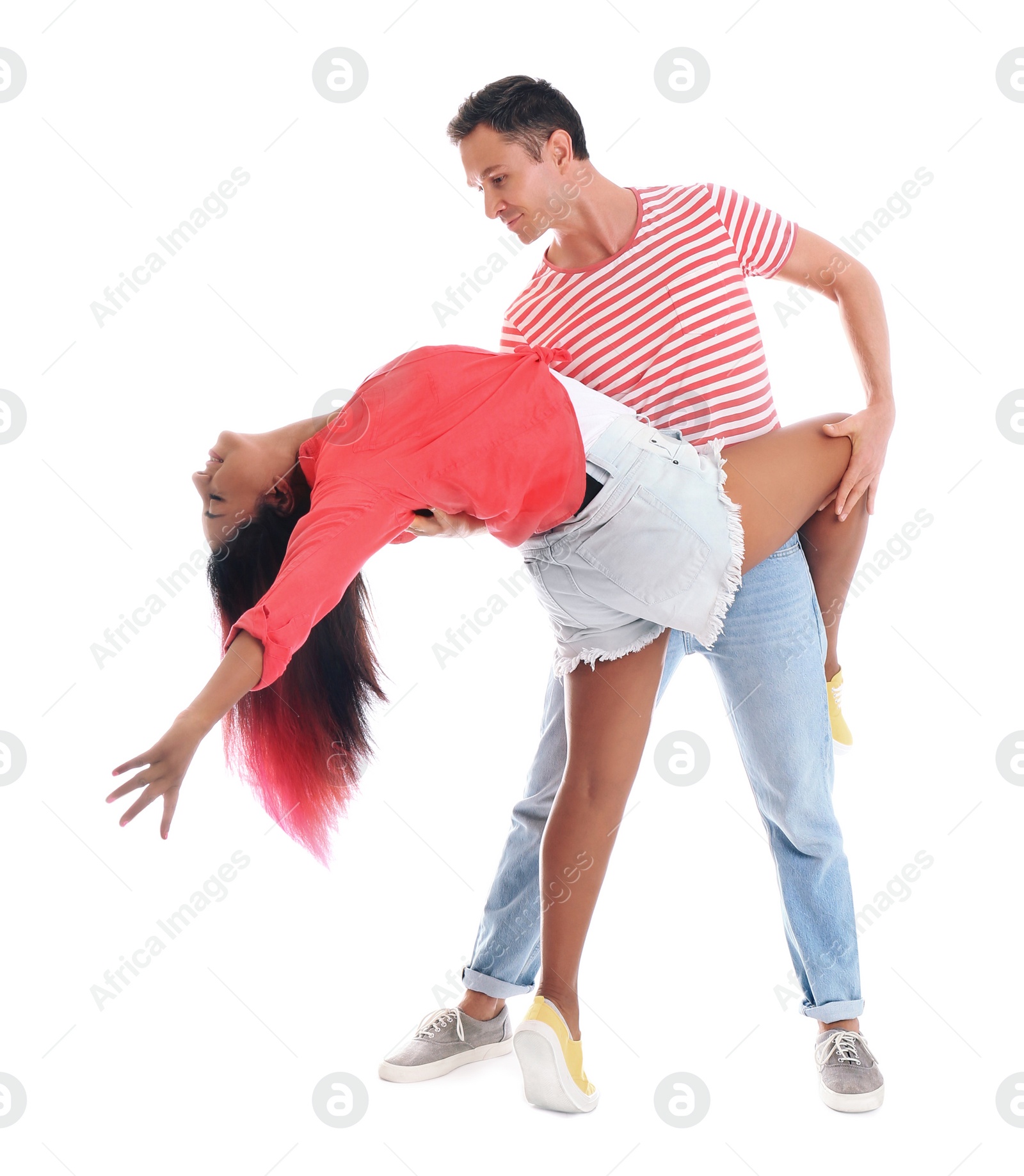 Photo of Beautiful lovely couple dancing on white background