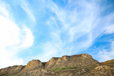 Photo of Beautiful blue sky and hill on cloudy day