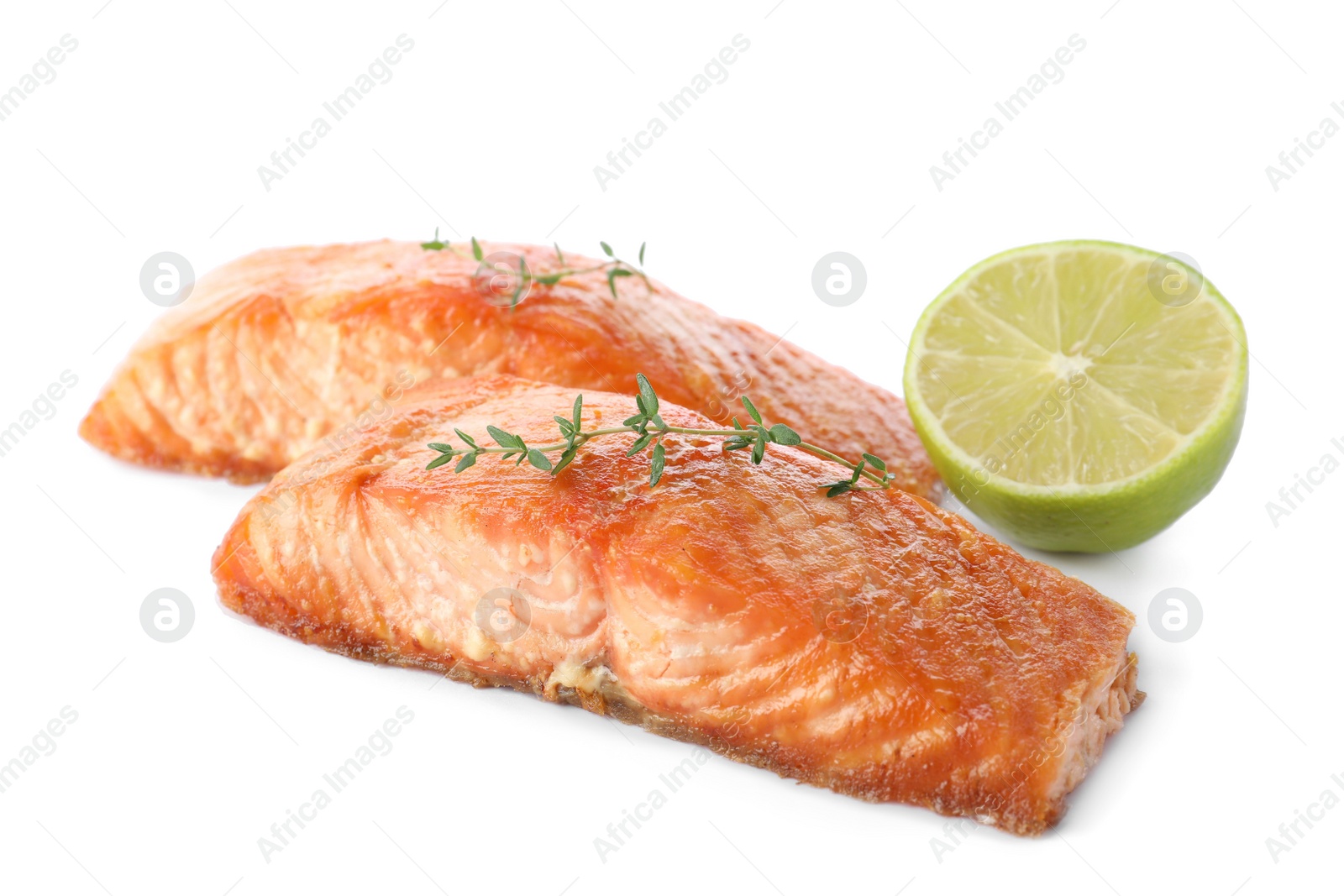 Photo of Delicious roasted fish with thyme and lime isolated on white