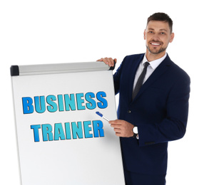 Professional business trainer near flip chart board on white background