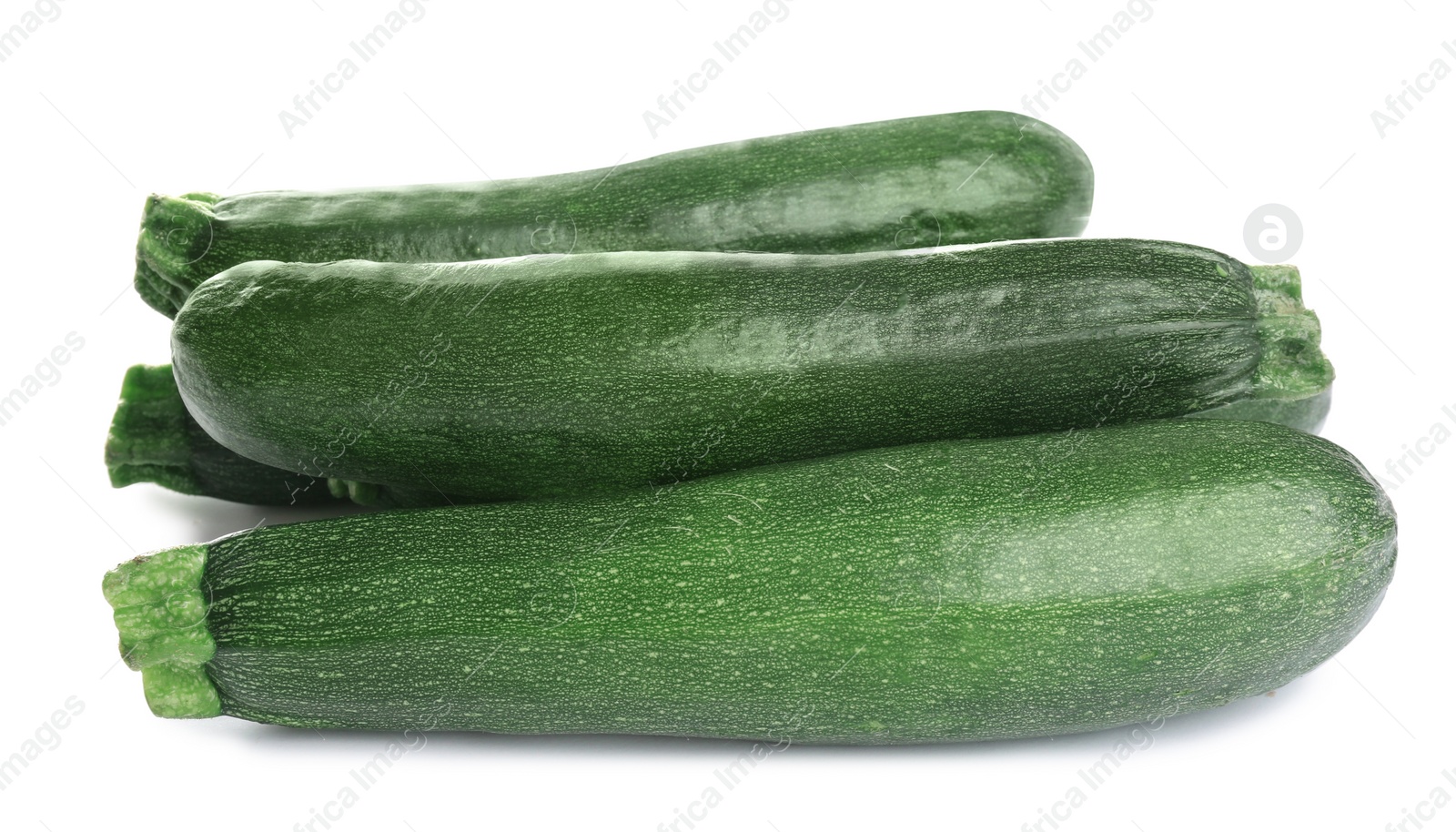 Photo of Fresh ripe green zucchinis isolated on white