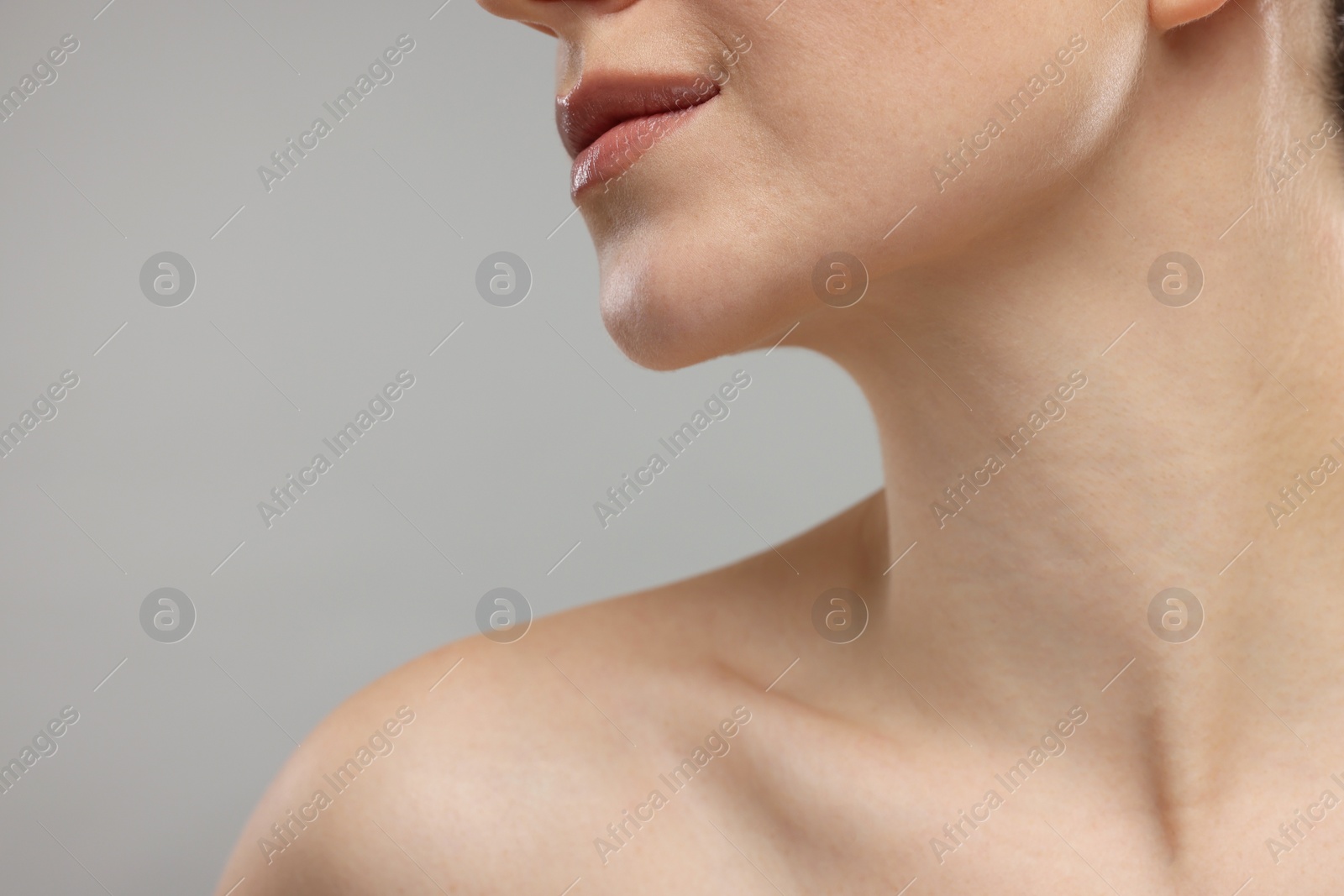 Photo of Beauty concept. Woman on grey background, closeup