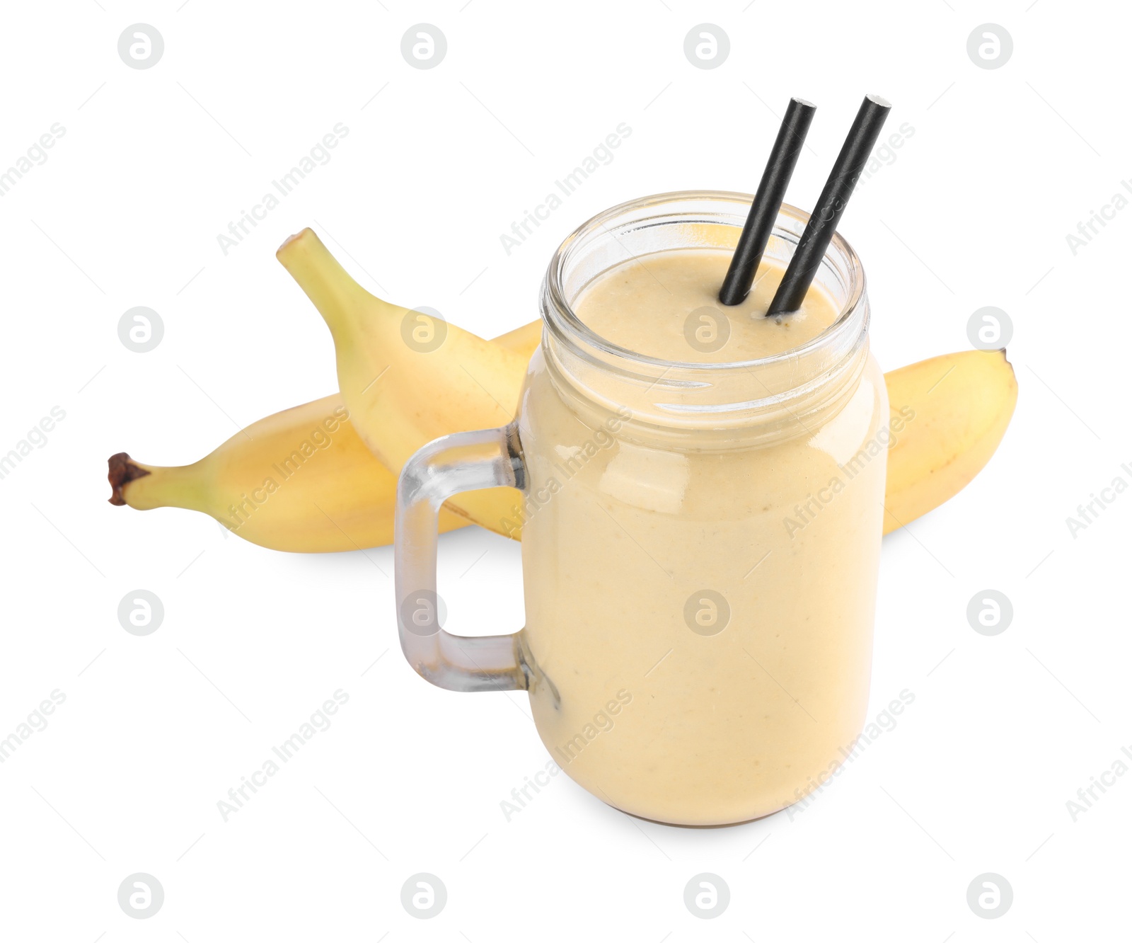 Photo of Mason jar with smoothie and bananas on white background