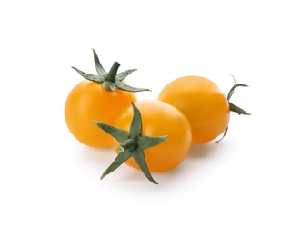 Photo of Ripe yellow cherry tomatoes on white background