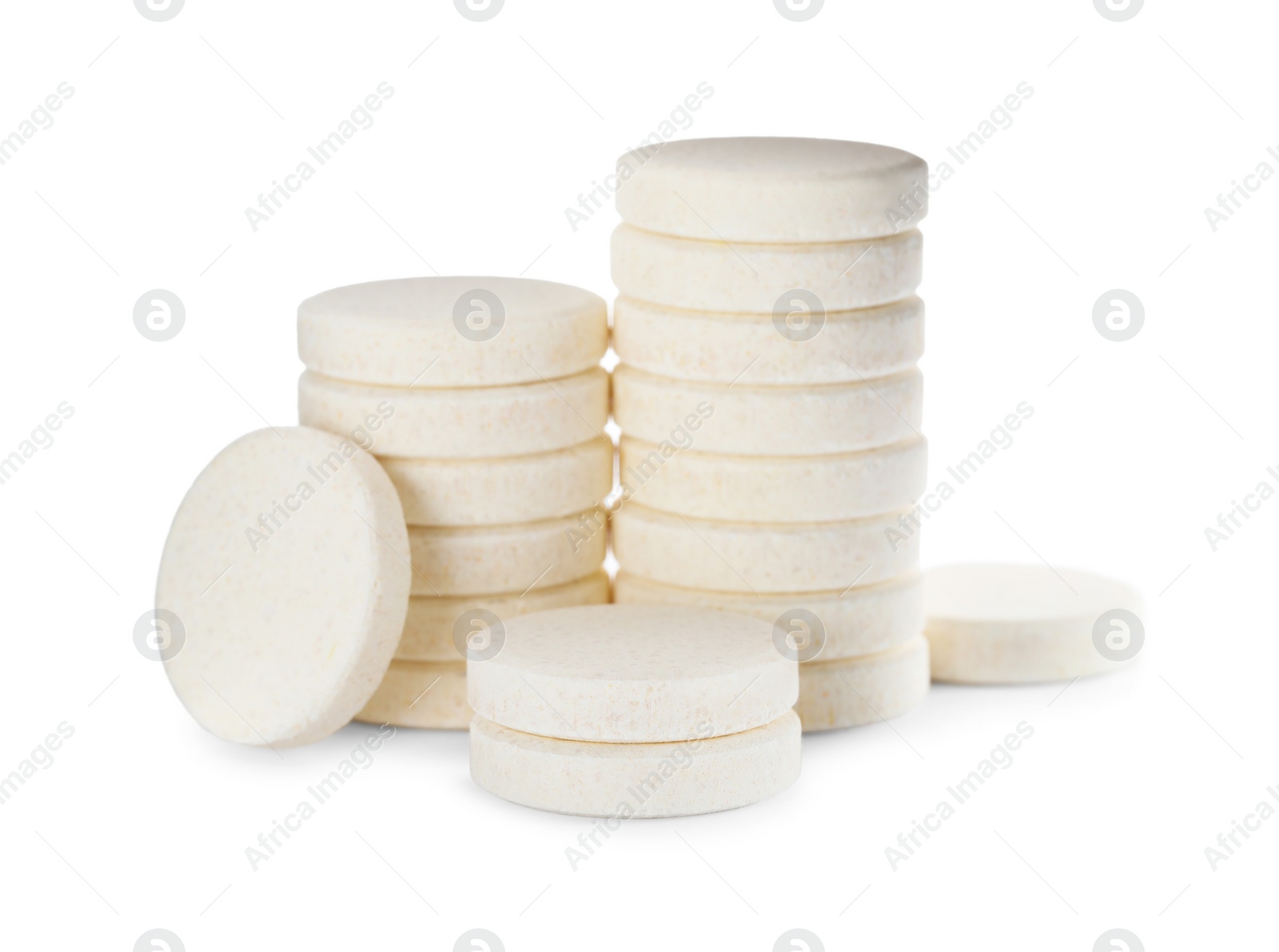 Photo of Pile of vitamin pills on white background