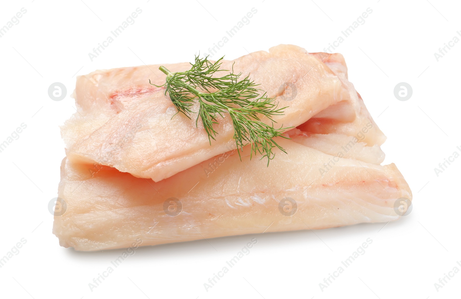 Photo of Pieces of raw cod fish and dill isolated on white