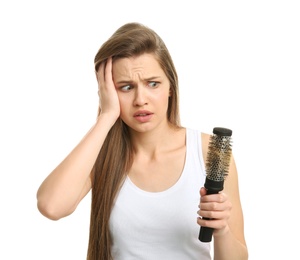 Young woman with hair loss problem on white background