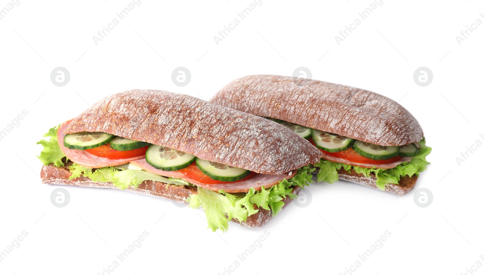 Photo of Tasty sandwiches with ham isolated on white