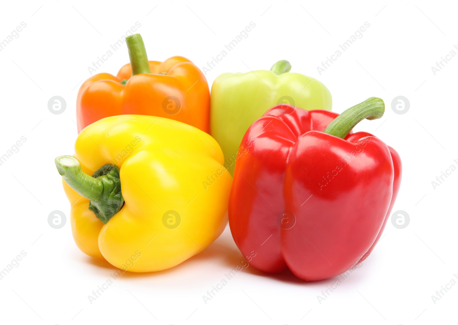 Photo of Fresh ripe bell peppers on white background