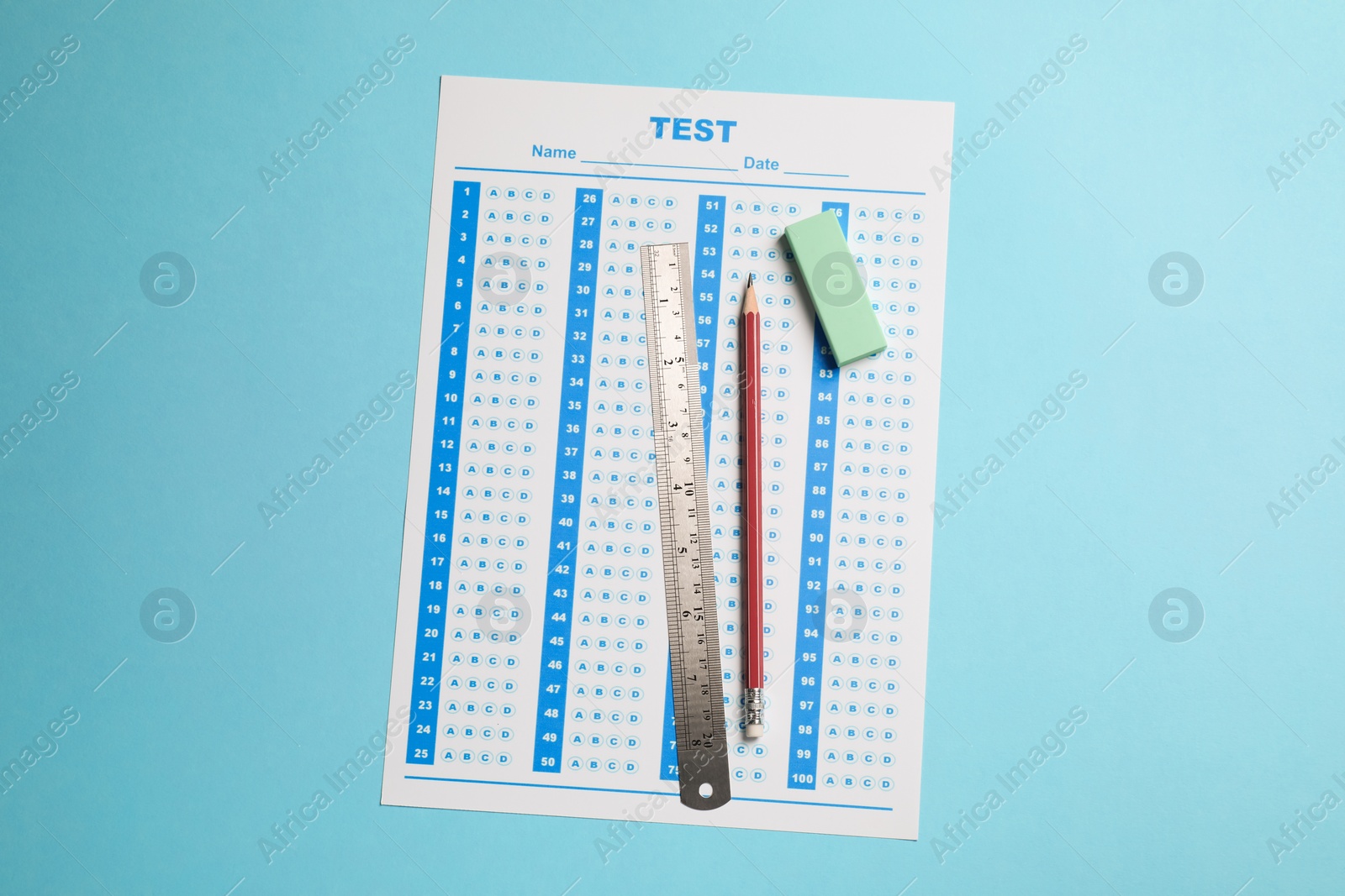 Photo of Answer sheet, pencil and ruler on light blue background, top view. Student passing exam