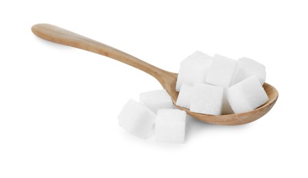 Photo of Many sugar cubes and wooden spoon isolated on white