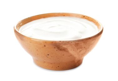 Photo of Bowl with yummy yogurt on white background