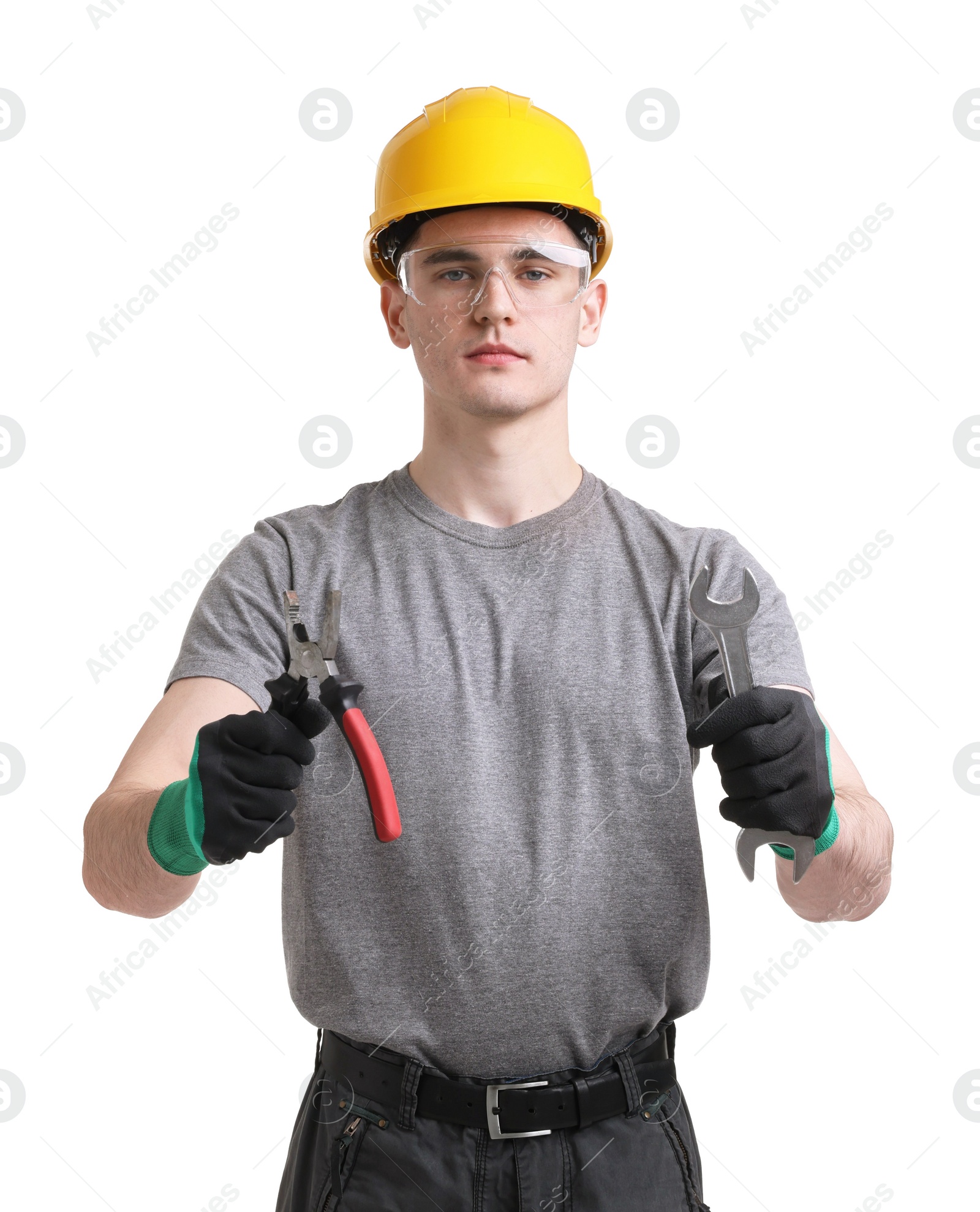 Photo of Young man holding pliers on white background