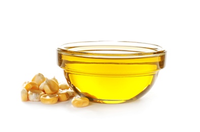 Bowl with fresh corn oil and kernels on white background