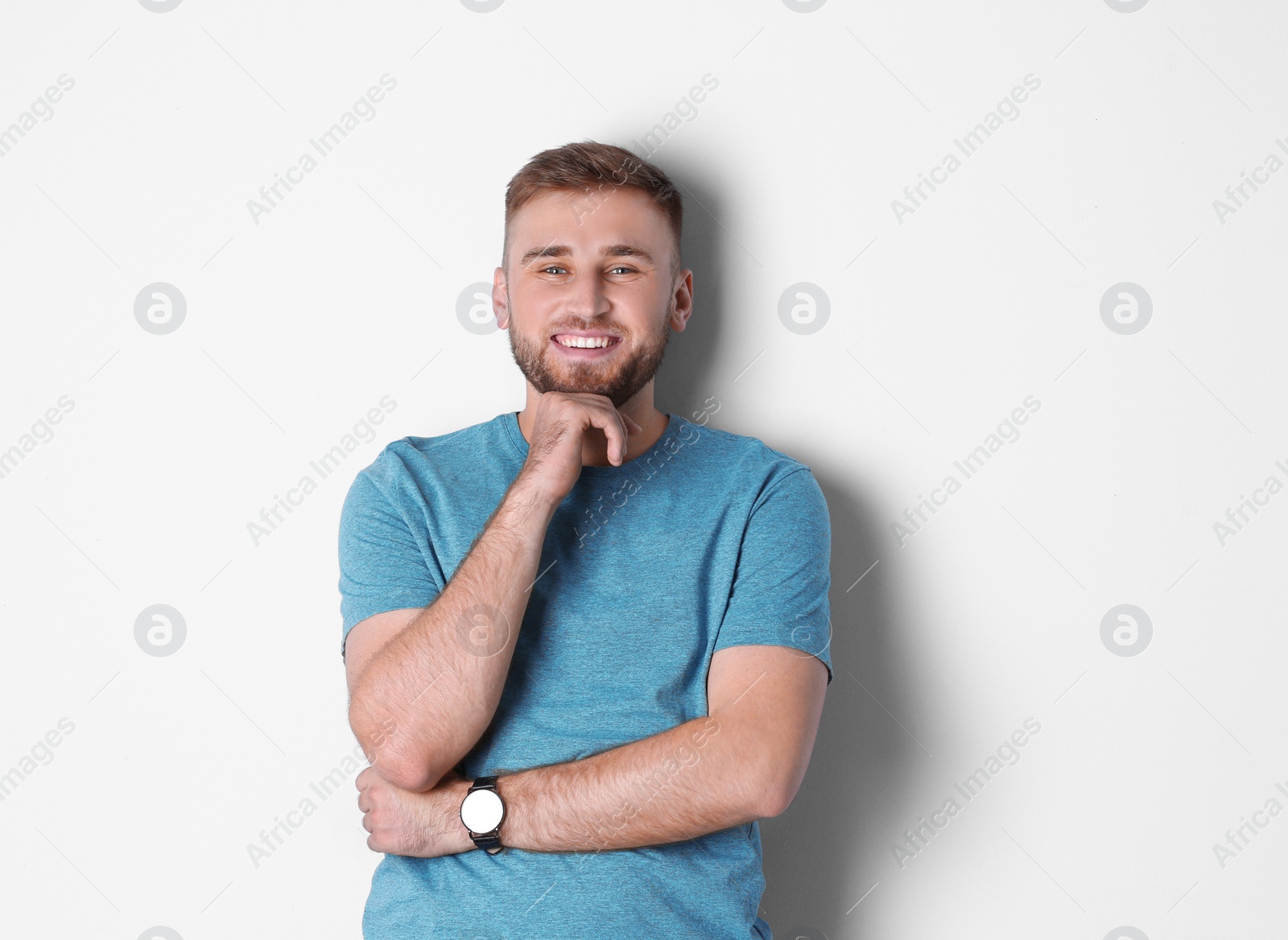 Photo of Portrait of handsome happy man on white background