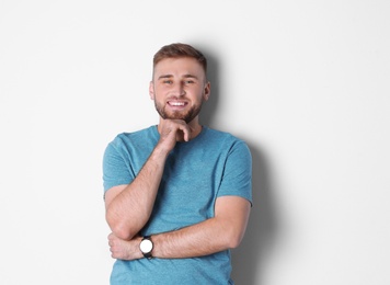 Photo of Portrait of handsome happy man on white background