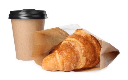 Photo of Delicious fresh croissant and paper cup with coffee isolated on white