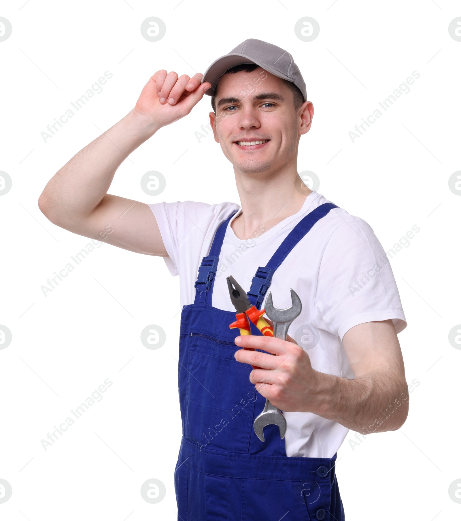 Photo of Young man holding pliers on white background