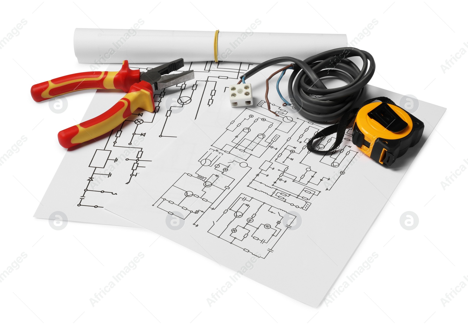 Photo of Wiring diagrams, wires, pliers and tape measure isolated on white