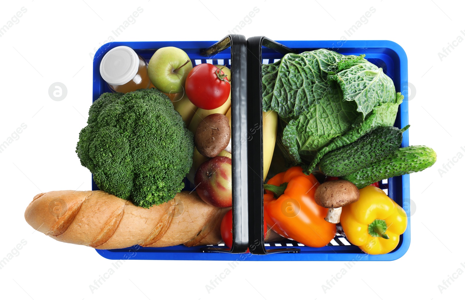 Photo of Shopping basket with grocery products on white background, top view