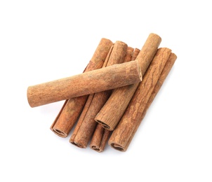 Photo of Aromatic cinnamon sticks on white background