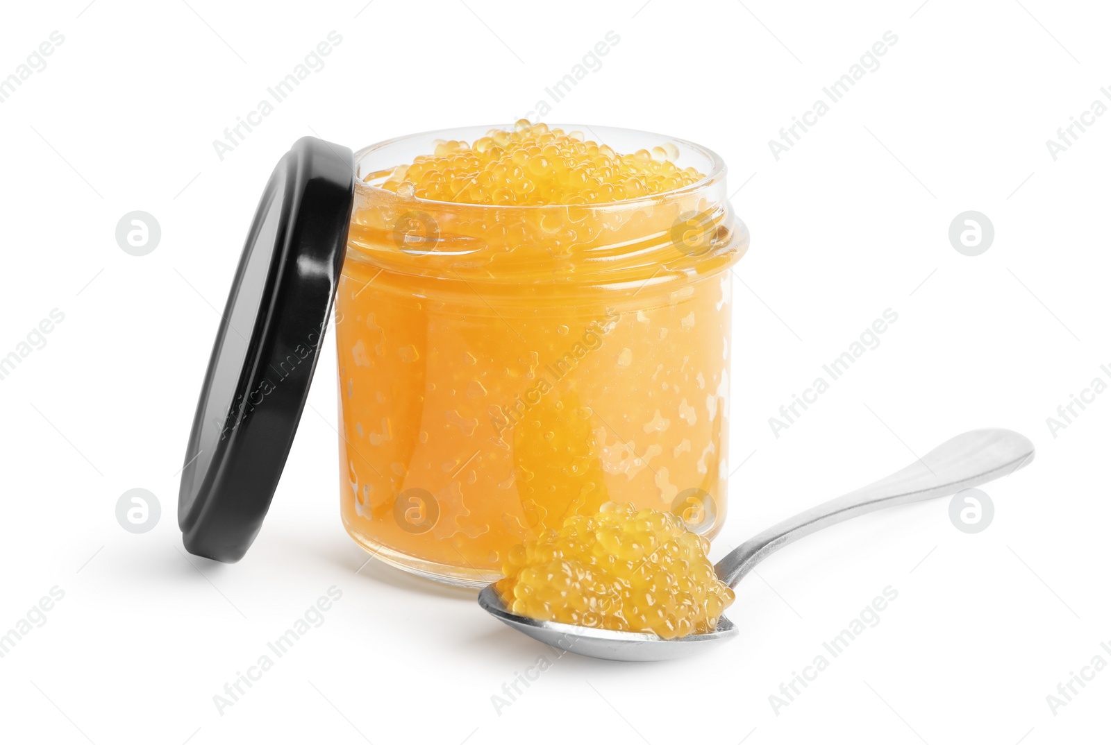 Photo of Fresh pike caviar in glass jar and spoon isolated on white