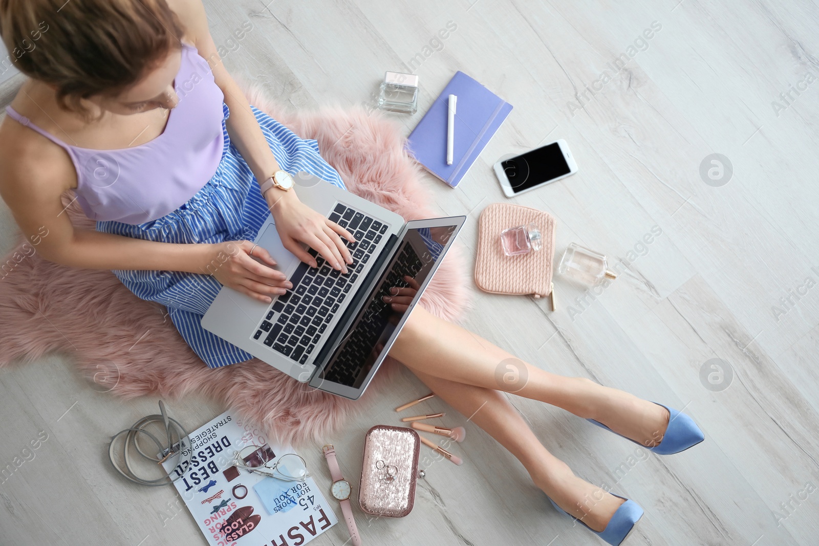 Photo of Female beauty blogger with laptop indoors, top view