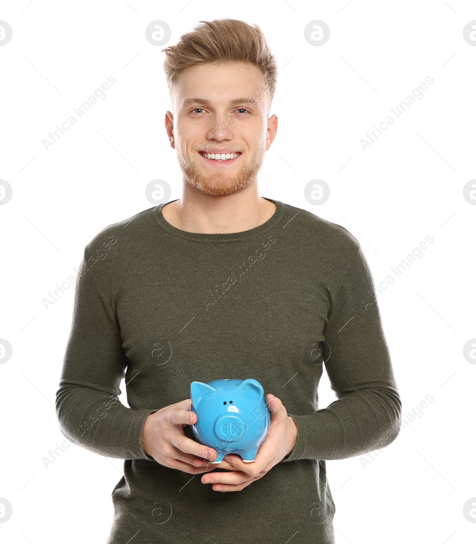 Photo of Young man with piggy bank on white background