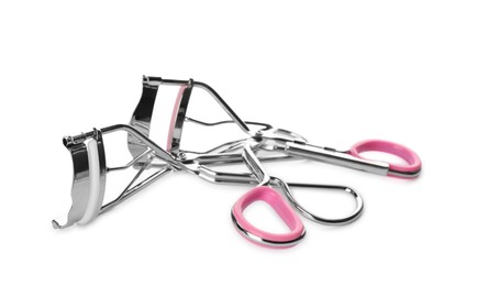 Photo of Two eyelash curlers isolated on white. Makeup tool