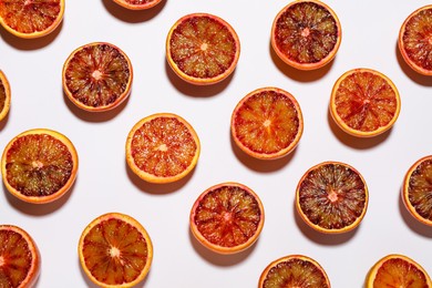 Photo of Many ripe sicilian oranges on white background, flat lay