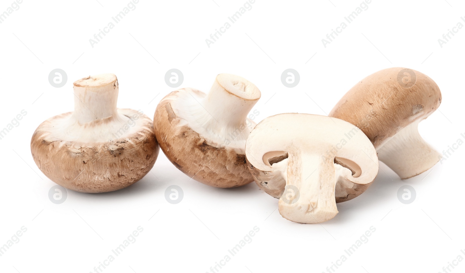 Photo of Fresh raw champignon mushrooms on white background